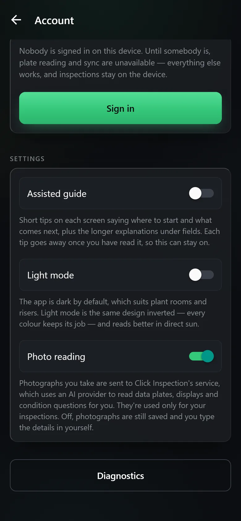 The Account screen in the dark theme: Assisted guide off, Light mode off, Photo reading on, each with its explanation.